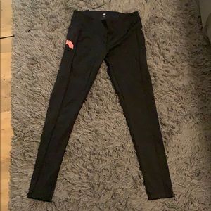 Feed Me Fight Me black donut leggings with pocket